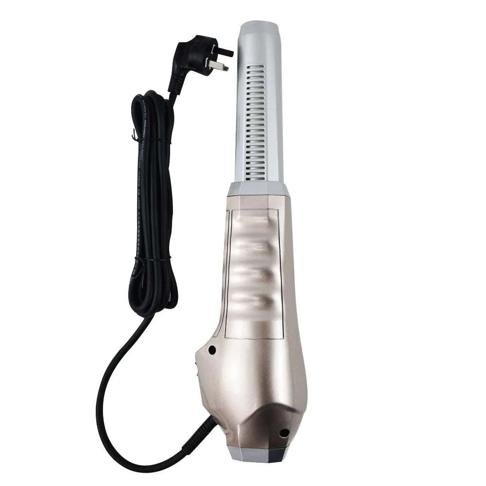 Silver and black handheld device with a power cord on a white background
