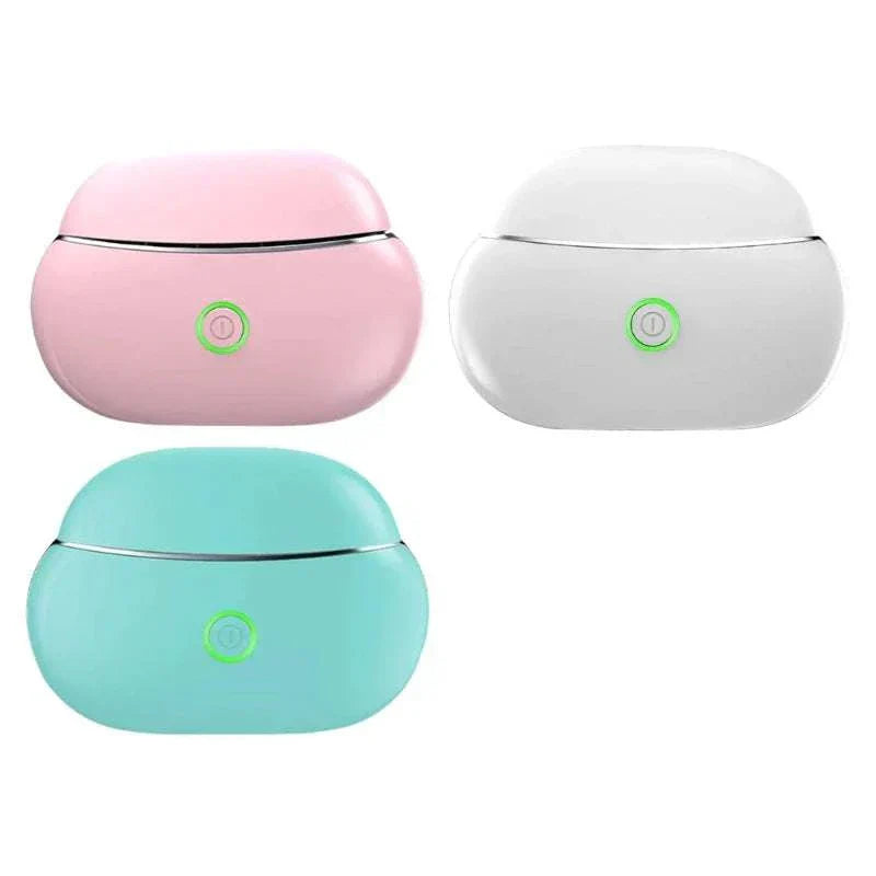 Portable Gua Sha face massager in pink, white, and blue with light therapy feature for skin tightening and relaxation.