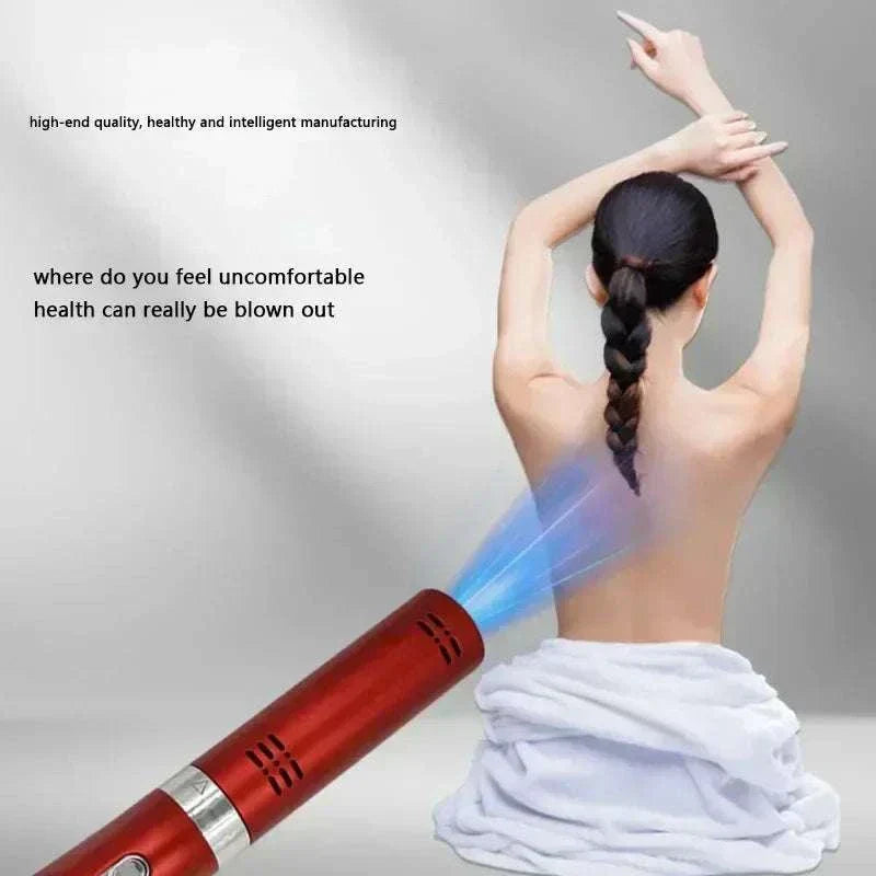 Terahertz Therapy Wand in red emitting energy waves for portable heat therapy and pain relief on back of seated woman wrapped in towel